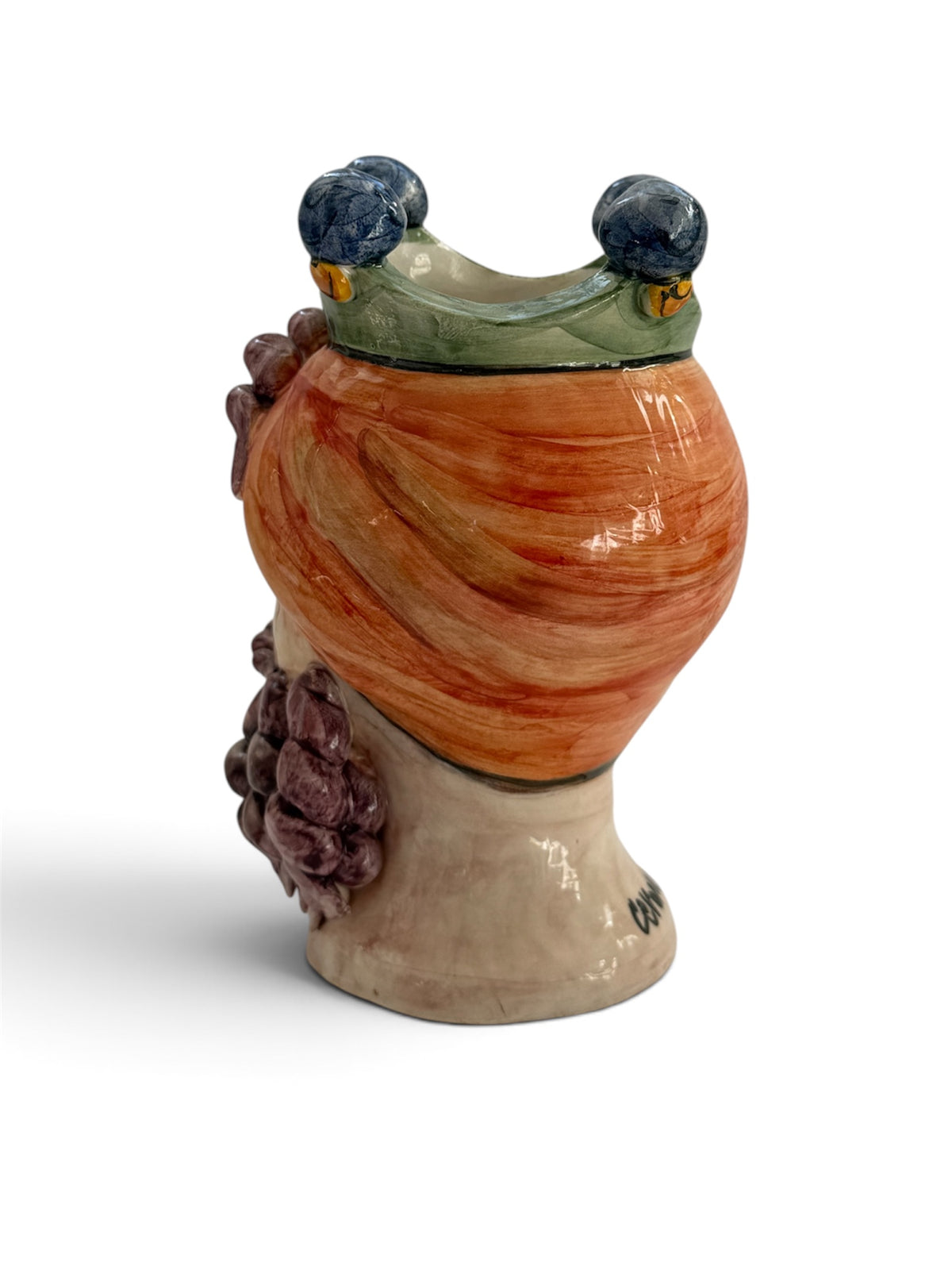 Retro della testa di Polifemo Re in ceramica, con turbante arancio e apertura della corona verde